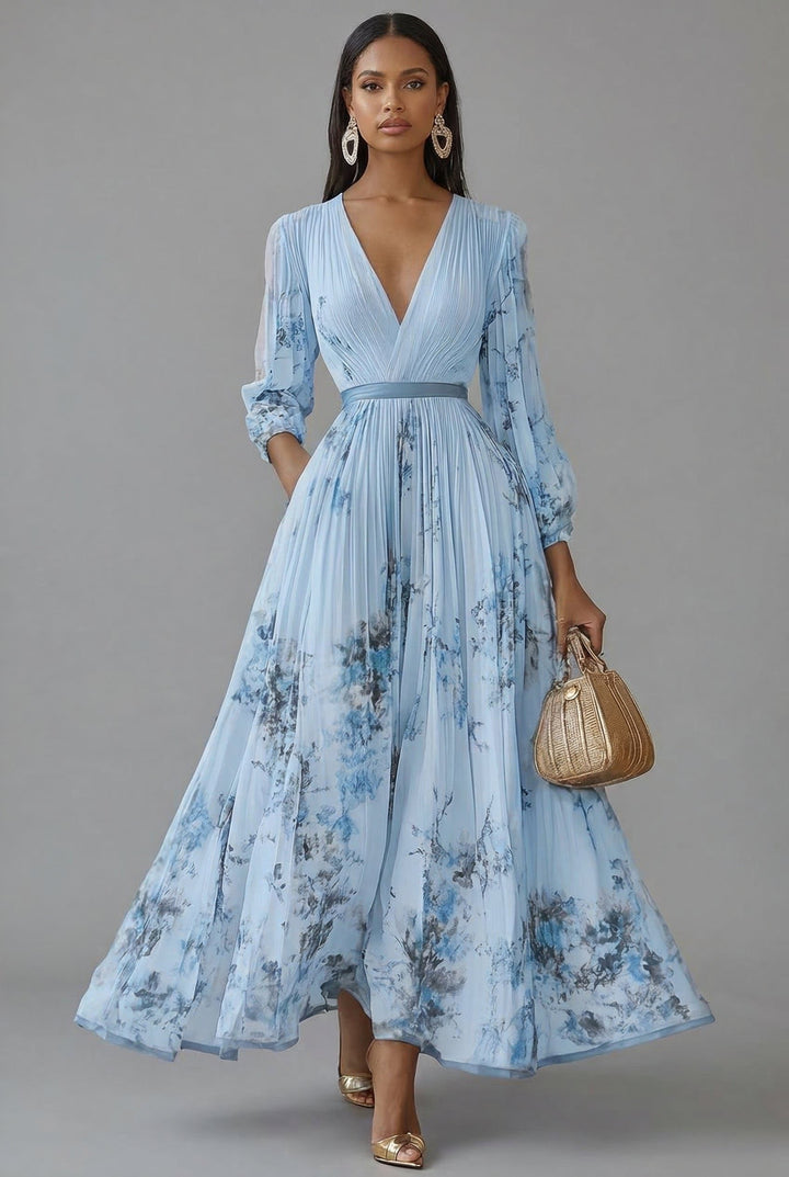 Front view with v-neckline, long sleeves and pleated skirt, blue