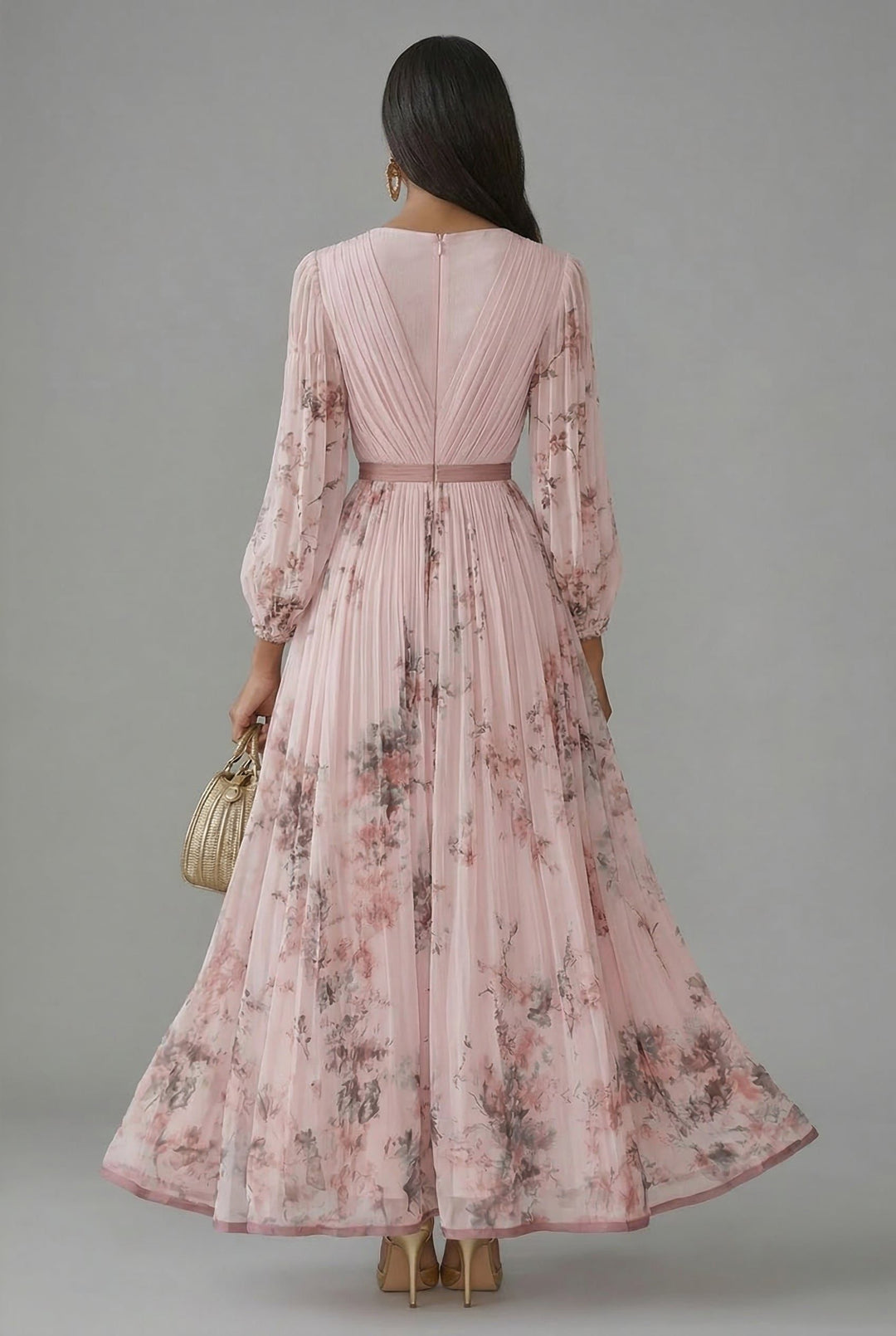 Back view showing back zip, banded waist and pleated skirt