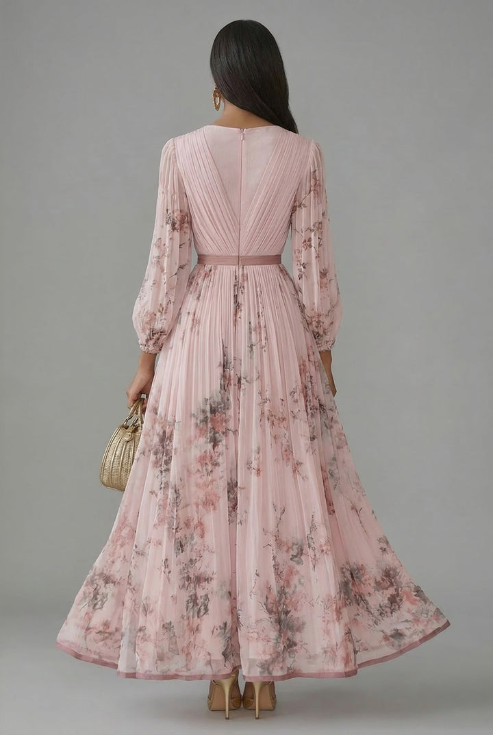 Back view showing back zip, banded waist and pleated skirt