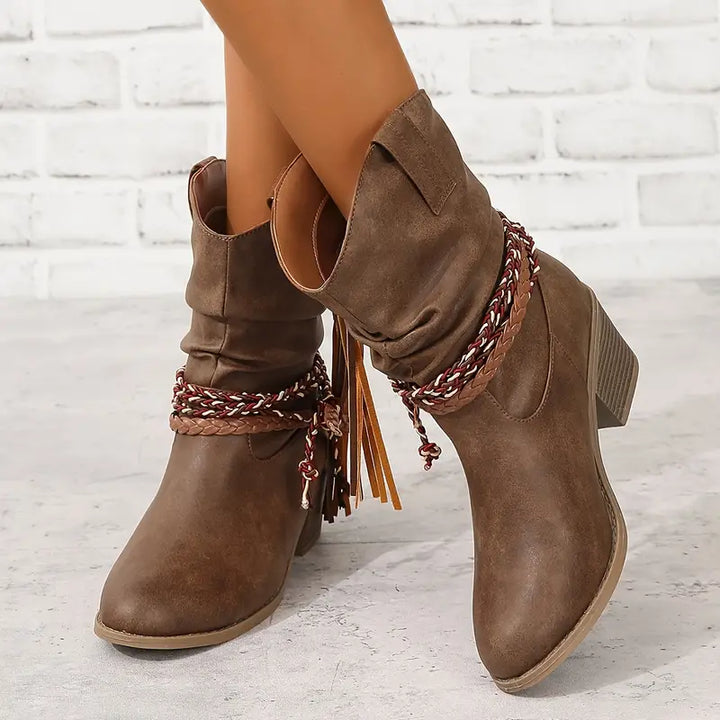 Front view of slouched shaft with braided wraps, tassels and pull tab