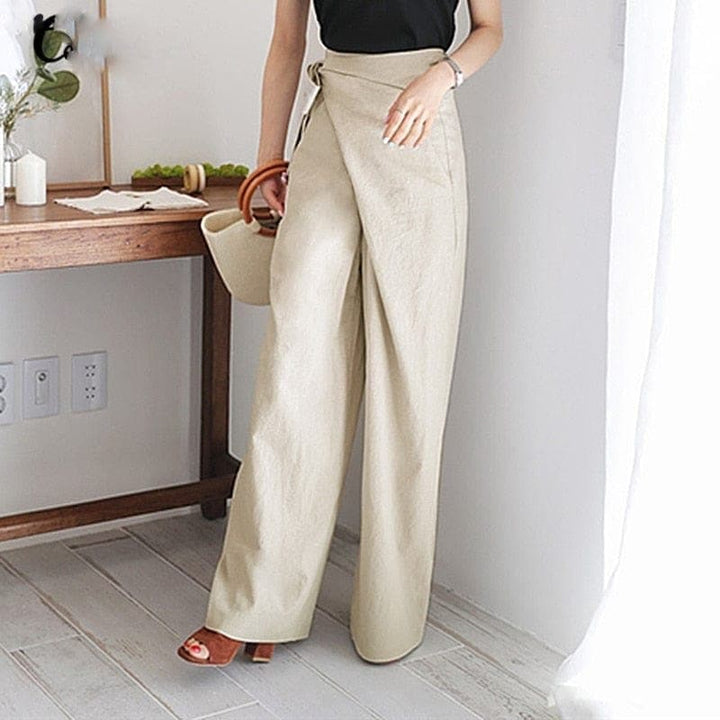 Front view of wrap front panel with side tie and wide legs, beige