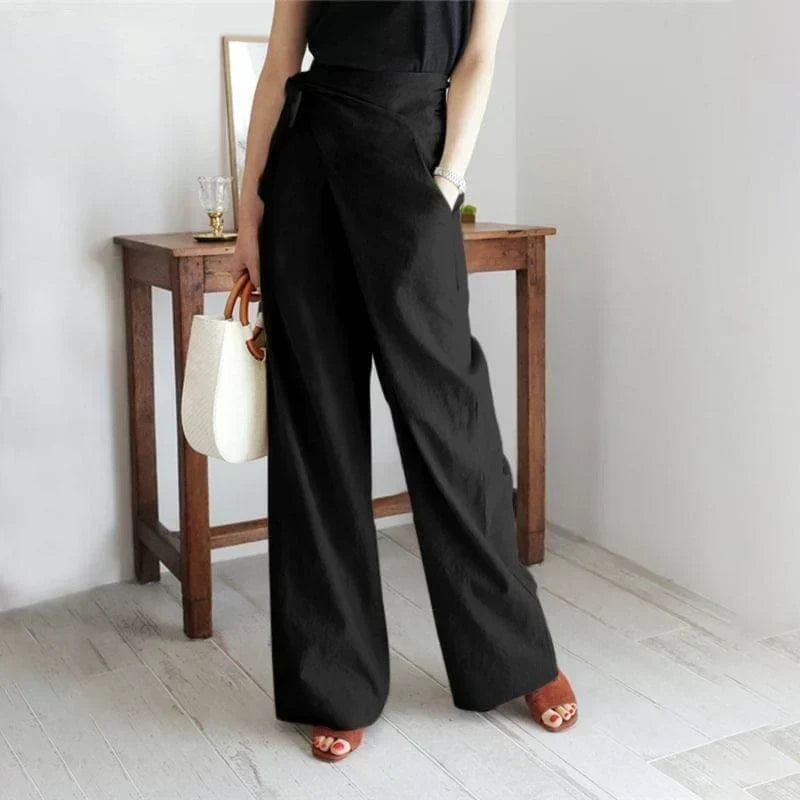 Front view of wrap front and full-length wide legs, black