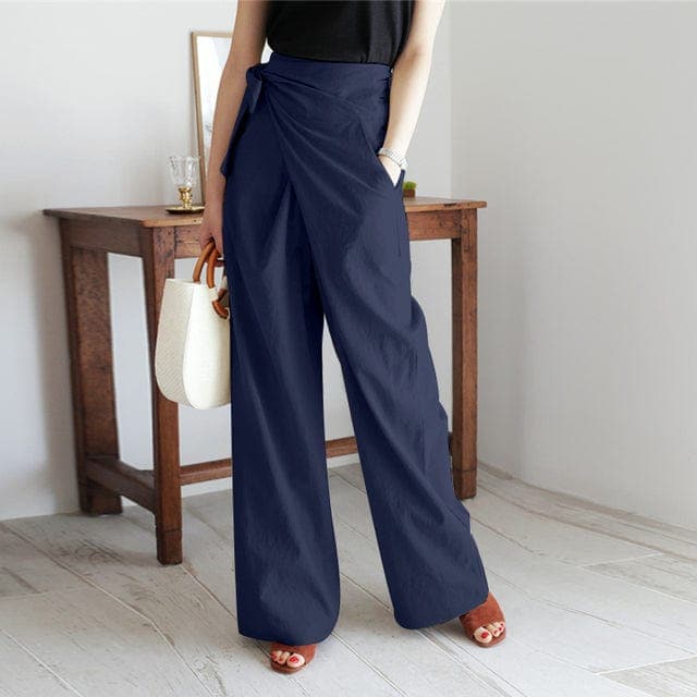 Front view of banded waist with side tie and wide legs, navy blue