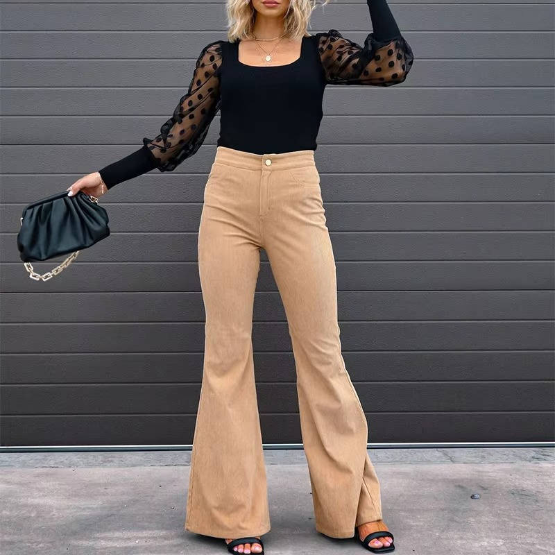 Front view showing high waist and flared legs, khaki