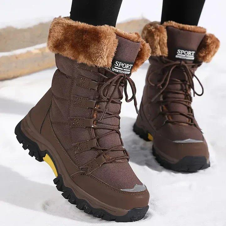 Front view showing lace-up front, fold-over collar and lugged sole, brown