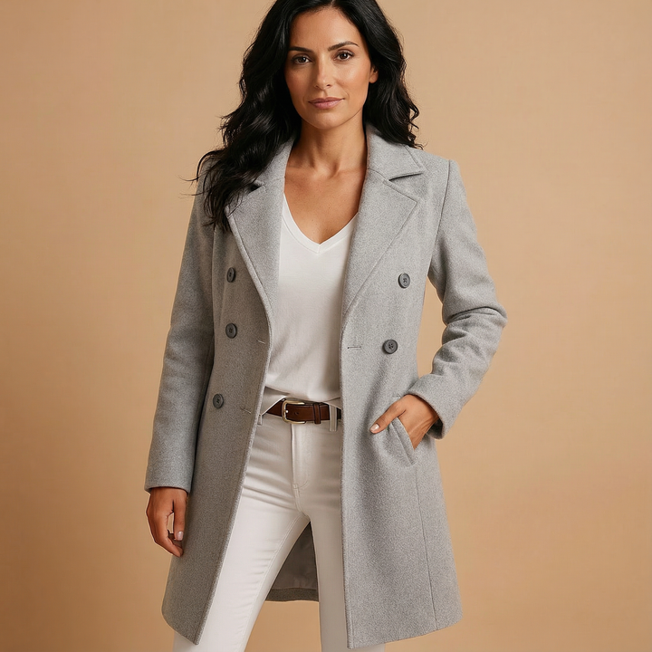Front view showing lapels, double-breasted button closure and side pockets, grey