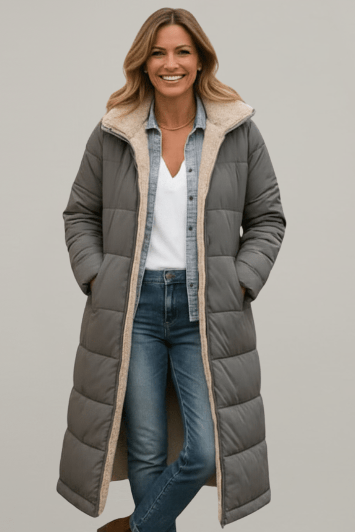 Front view showing stand collar, quilted panels and side pockets, grey