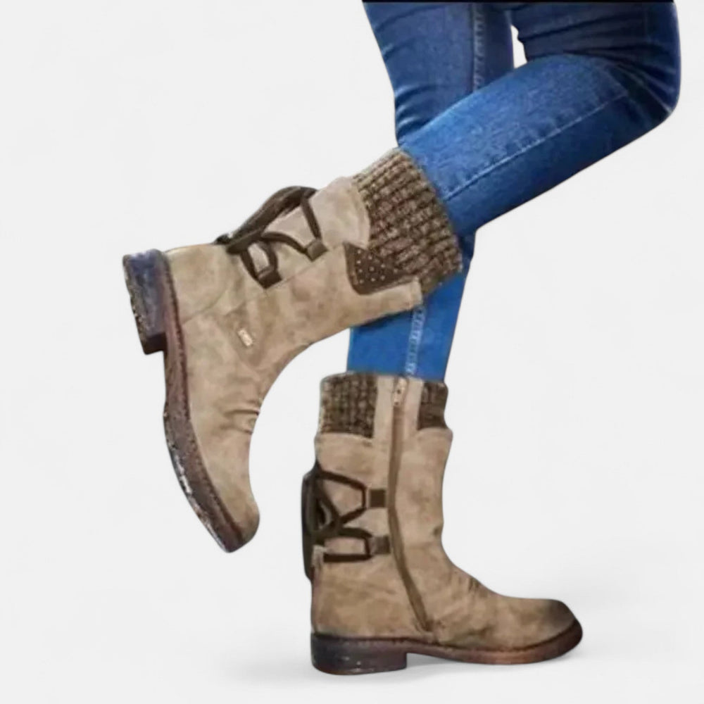 Front view showing ribbed cuff, studded panel and side zip