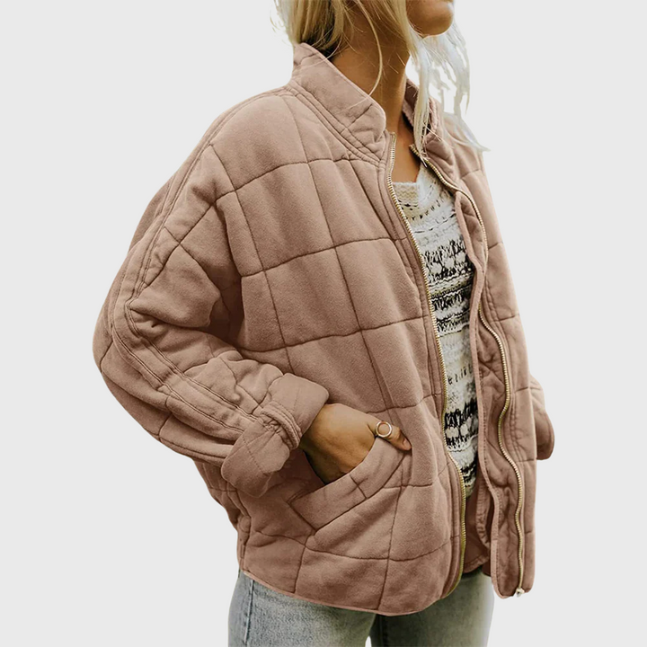 Front view showing stand collar, zip front and side pocket, khaki